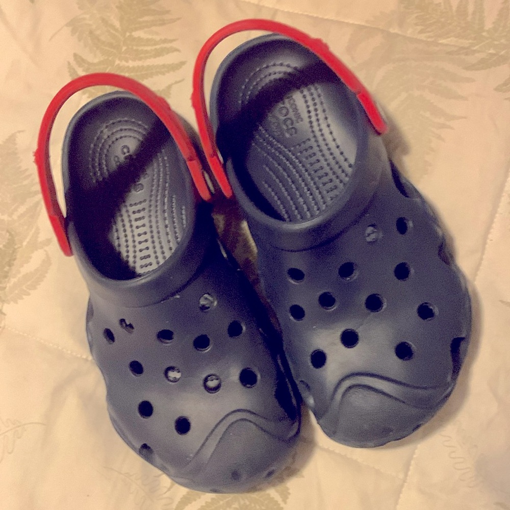 Crocs - Navy Blue w/Red Straps junior size 5/6 in good condition.  9 inches long